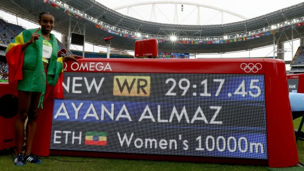 On top of the world: Almaz Ayana celebrates her world record.