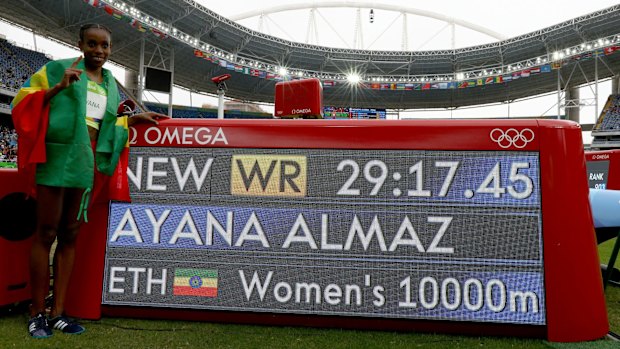 On top of the world: Almaz Ayana celebrates her world record.