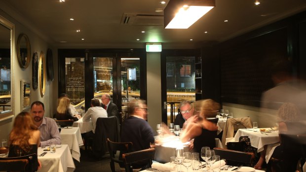 Australians continue to spend money on the experiential economy, such as dining out.