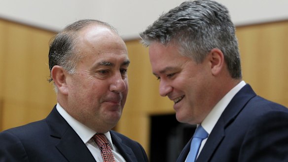 Secretary of Treasury John Fraser and Finance Minister Senator Mathias Cormann.