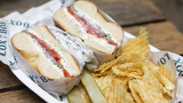 A classic lox bagel with pickles and chips from Lox in a Box. 