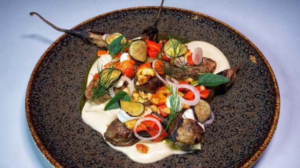 Japanese-style marinated eggplant served with hummus, roasted capsicum and hazelnuts.