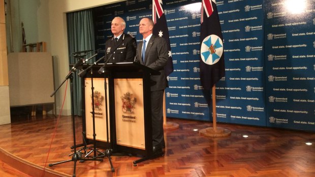 Deputy police commissioner Ross Barnett and Premier Campbell Newman address the media about the terror threat level raise.
