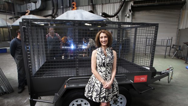 Mia McGregor with the trailer built by prisoners to collect goods for refugees.
