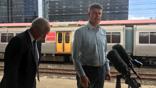 Transport Minister Stirling Hinchliffe, with Queensland Rail acting CEO Jim Benstead, was not able to absolutely guarantee no more QR troubles to come.
