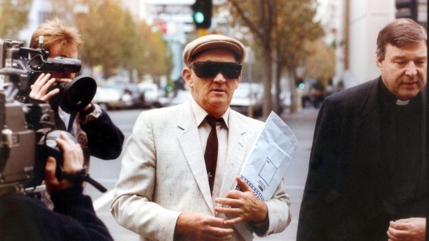Gerald Ridsdale outside court with George Pell in 1993.