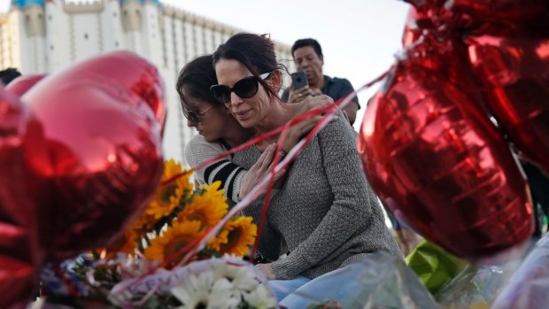 People pay tribute to the victims of the Las Vegas massacre.