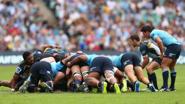 This is not what the fans want to see: The Waratahs and Brumbies packs lock horns in March.