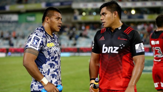 Brotherly shove: Allan and Michael Alaalatoa speak after the end of the Brumbies-Crusaders match earlier this season.
