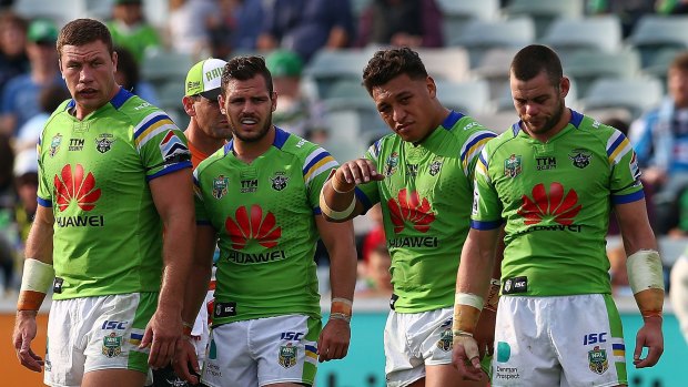 Dejected Raiders players Shannon Boyd, Aidan Sezer, Josh Papalii and Shaun Fensom during the match against Cronulla.