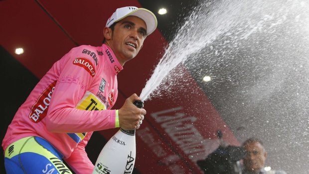 Contador celebrates the pink jersey.
