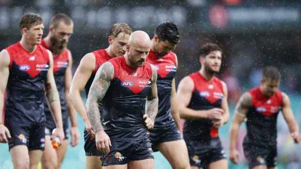 Not all good: The Dees trudge off the SCG after losing to Sydney.