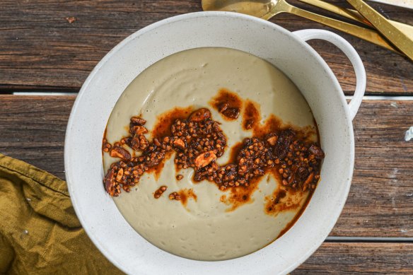 Celeriac and potato soup with crunchy buckwheat, almond and paprika topping.