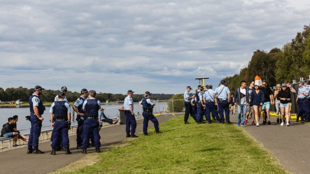 Police monitor the Defqon.1 dance party at the Sydney International Regatta Centre.