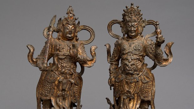 Lot 7. A pair of Chinese gilt-bronze Buddhist guardians. Ming Dynasty. Estimates. $40,000 to $60,000.