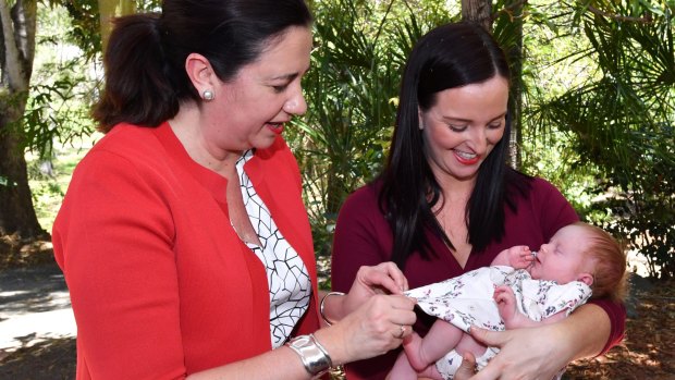 Queensland Premier Annastacia Palaszczuk with a cute baby who is not her own.