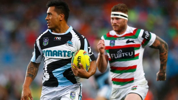 Renewed hope: Sosaia Feki of the Sharks runs in a try during the grand final match between the Rabbitohs and Cronulla in the Auckland Nines.