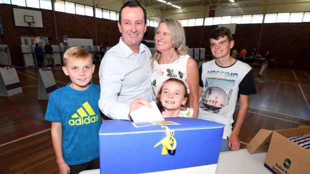 Poll position: Labor leader Mark McGowan casts his vote in the WA election with his family in tow.