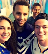 Steph Curry with Lachie Neale
