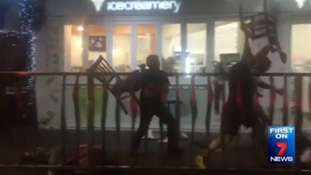 Men used chairs to beat each other outside an ice cream parlour in Brighton-Le-Sands.