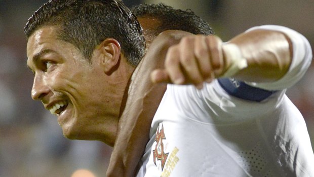 Cristiano Ronaldo celebrates a goal against Armenia.
