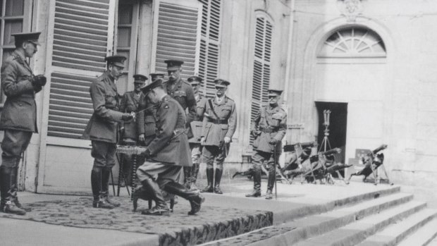 King George V, knighting Lieutenant General Sir John Monash, at the Corps Headquarters in the Chateau de Bertangles.