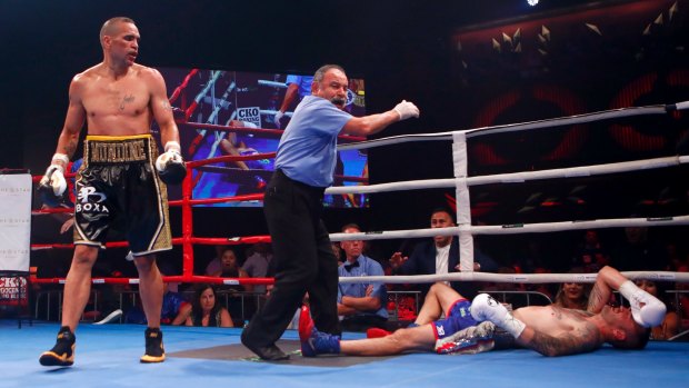 The end: Mundine finishes the fight.