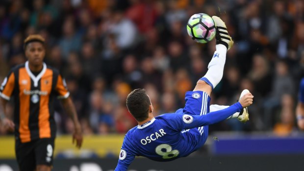 Near certain acquisition: Oscar attempts an overhead kick against Hull City for Chelsea.