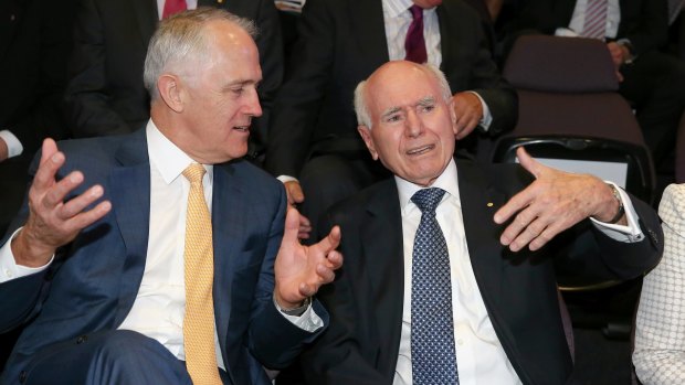 Mutual admiration: Mr Turnbull with former prime minister John Howard during the launch of the John Howard Walk of Wonder at science and technology centre Questacon in Canberra on Tuesday.