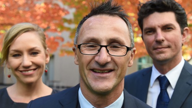 Greens leader Richard Di Natale (centre) has lost two of his senators to dual-citizenship confusion, Larissa Waters and Scott Ludlam. 