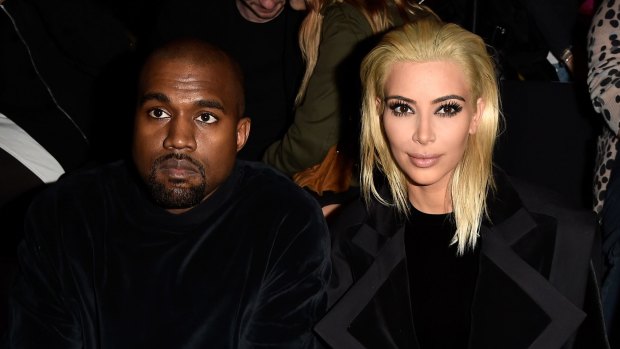 Kim Kardashian and Kanye West attend the Balmain show as part of the Paris Fashion Week Womenswear Fall/Winter 2015/2016 on Thursday.  