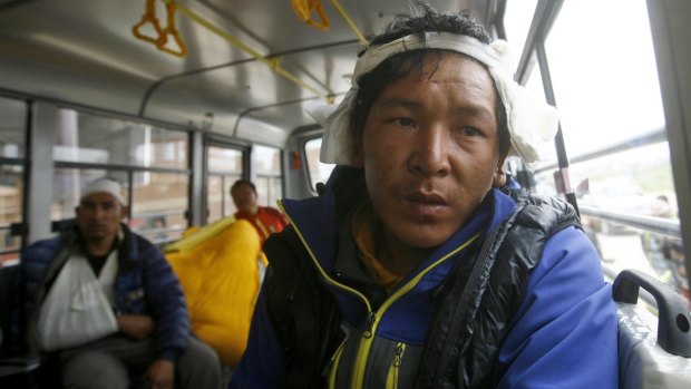 Injured Sherpa guides being evacuated from Mount Everest Base Camp on Sunday.