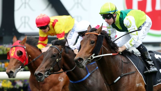 Easing home: Tommy Berry rides Divine Prophet to win the Up And Coming Stakes.
