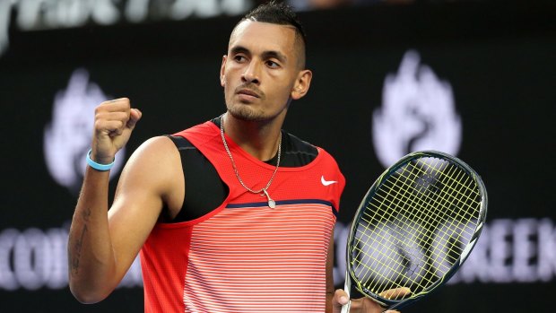 Nick Kyrgios celebrates winning a break point in his first round match against Pablo Carreno Busta of Spain during day one of the 2016 Australian Open.