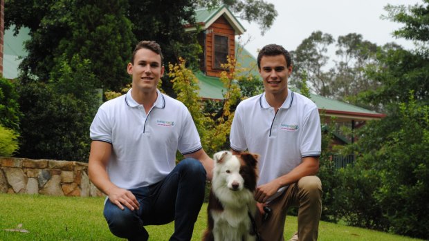 Barking Orders' founders Ryan and Jarryd Boyd with their border collie Ned.