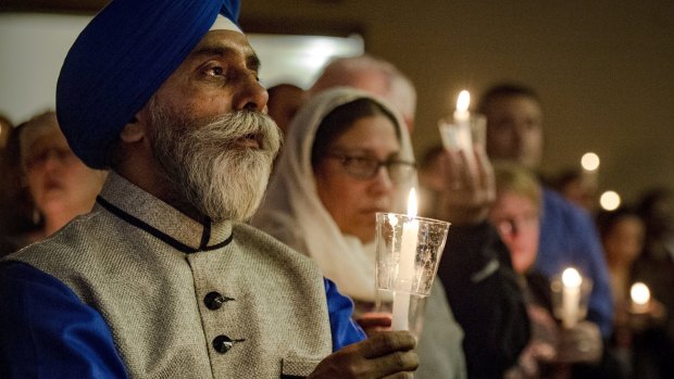 Hundreds of people attend a vigil in Olathe, Kansas, ast week,  in response to the deadly shooting of Srinivas Kuchibhotla.