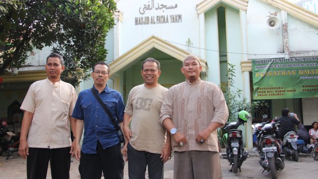 Islamic State supporter Budi Waluyo (right) with three former Jemaah Islamiah members in front of the al-Fataa mosque in Jakarta.