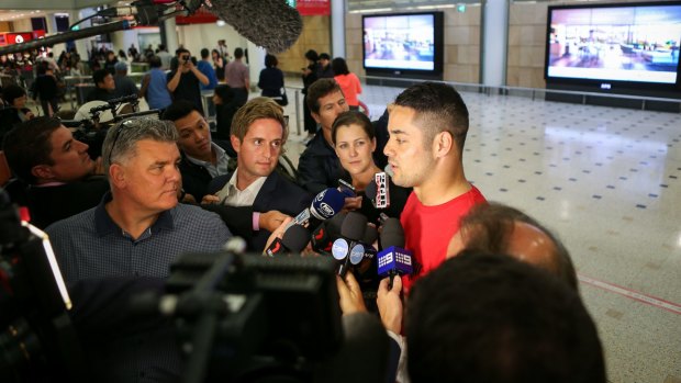 Back in town: Jarryd Hayne speaks to the media at Sydney Airport.