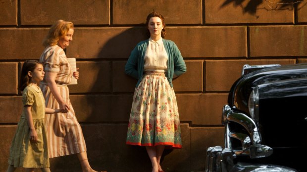 Saoirse Ronan (centre) plays the smart and dedicated Eilis in <i>Brooklyn</i>.