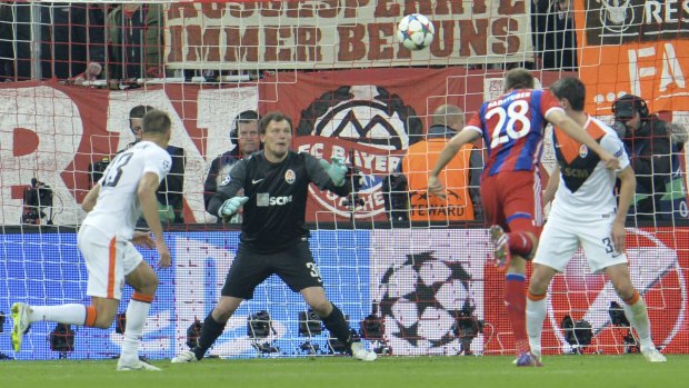 Bayern's Holger Badstuber,scores his side's fifth goal.