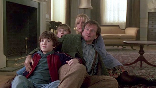 Robin Williams with Bradley Pierce, Kirsten Dunst and Bonnie Hunt in the 1995 original.