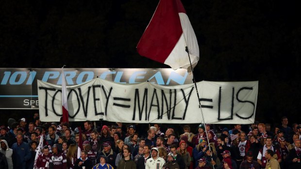 Our man: Sea Eagles supporters show their support for axed coach Geoff Toovey. 