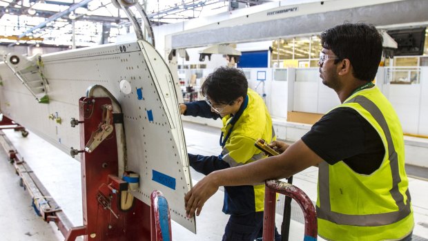 New horizons after the decline of the car industry: Boeing employees work on aircraft parts at its factory in Port Melbourne.