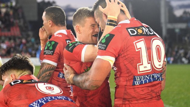 One for true believers: Matt Dufty enjoys victory after a tight contest in challenging conditions.