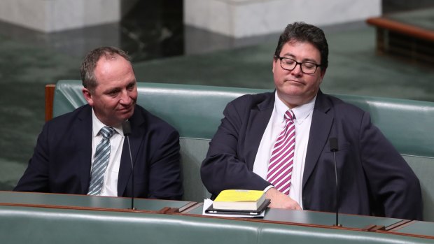 Deputy Prime Minister Barnaby Joyce and George Christensen during the second reading of the Banking and Financial Services Commission of Inquiry Bill.