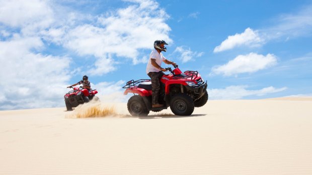 Riding the dunes.