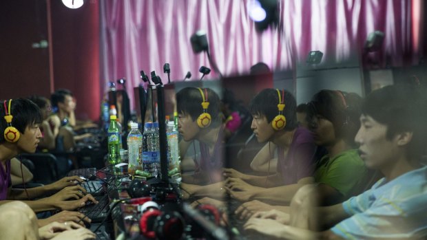 An internet cafe in Huamingzhen, Tianjin, China. With the United States and China suspicious of the other's digital espionage, American tech companies are caught in the middle. 