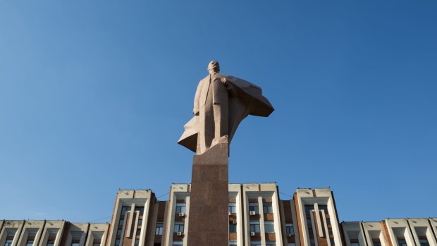 A statue of Lenin stands outside the parliament building in Tiraspol, the capital of Transnistria.
