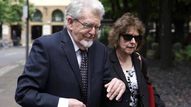 Rolf Harris, pictured during an earlier court appearance with his niece Jenny Harris, is seeking to have all 12 convictions thrown out.