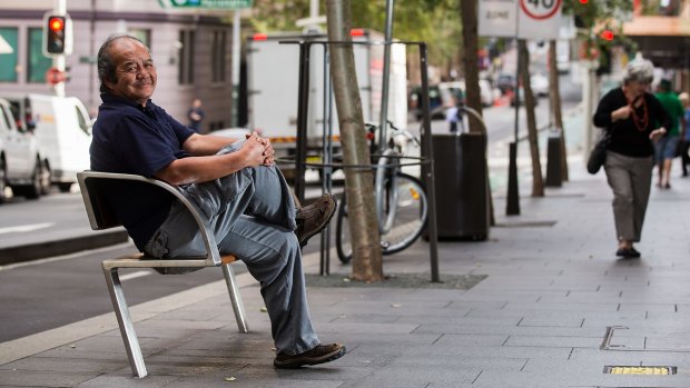 The expert: Ronny Ng poses on a new bench, part of the City of Sydney's $3 million suite of city furniture. 